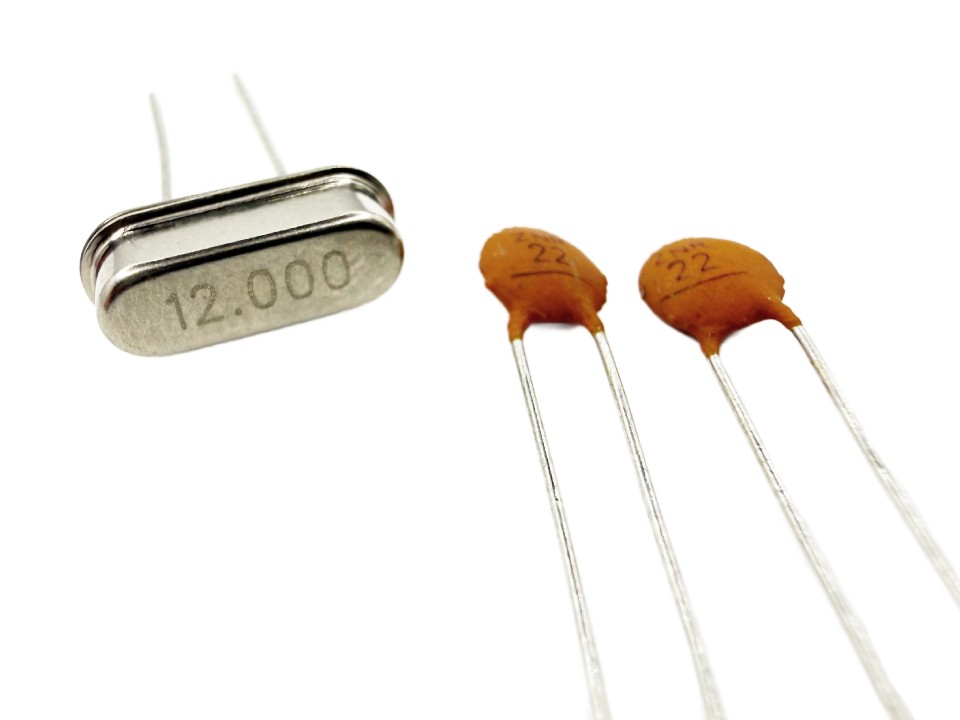 12 MHz Crystal with 22pF Capacitors - Image 1